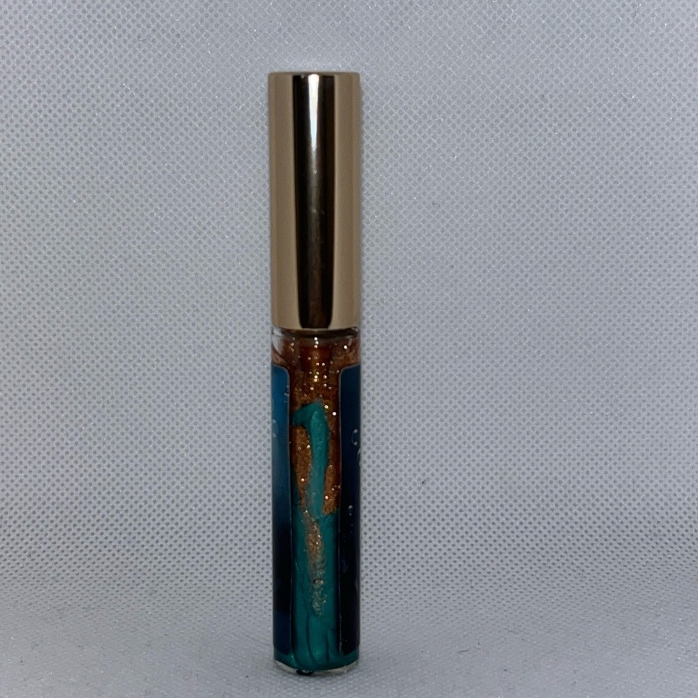 Notoriously Morbid Lip Gloss Aqua Snacks